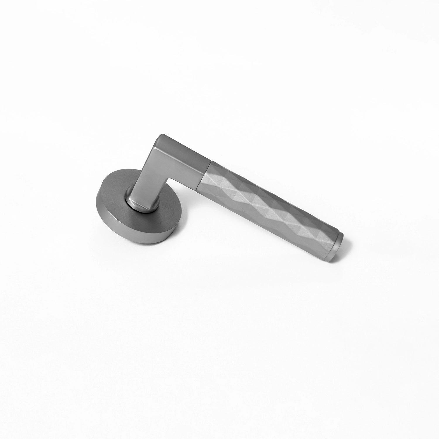 Internal door handle Fendal-02 in nickel finish, showcasing the bottom angle with diamond pattern grip.